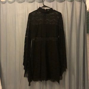Black lace dress with bell sleeves